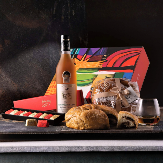 Cesto di Natale Distillati "Tentazioni..." - Liqueur Poire e Cognac con dolce "Cocule" e Gianduiotti