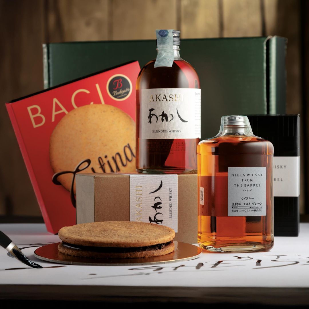 Cesto di Natale Distillati "Geisha" - 2 whisky con dolce