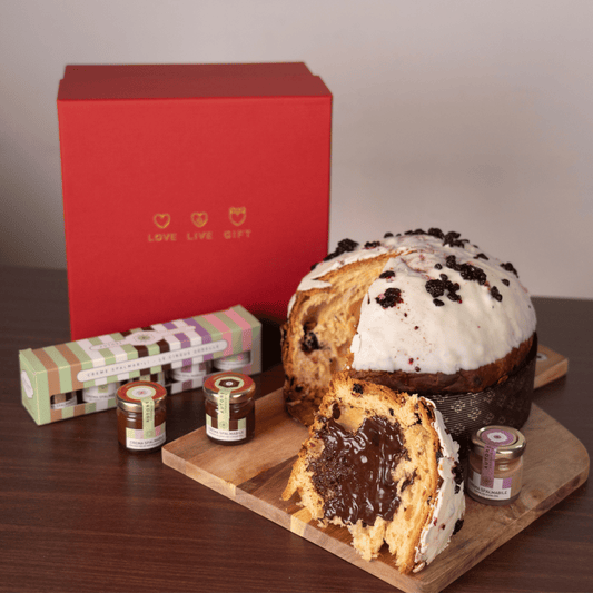 Artisan Panettone 72 Stunden Verarbeitung mit Himbeere und „Satri“-Schokolade 1 kg in zylindrischer Pink Petal-Hutschachtel